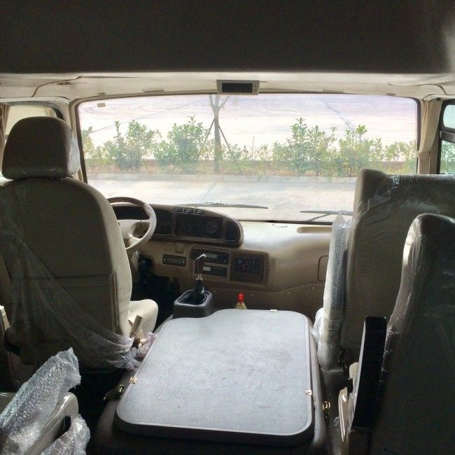 Bus Transportasi Coaster Diesel 7m 25 Seater dengan Emisi Euro 4 dan Suspensi Leaf Spring