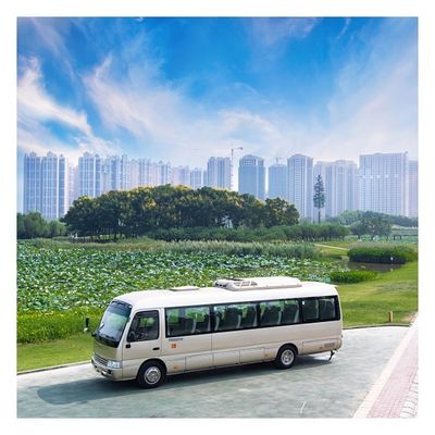 Bus Diesel Coaster Dengan AC Dan Kursi Belakang Tinggi
